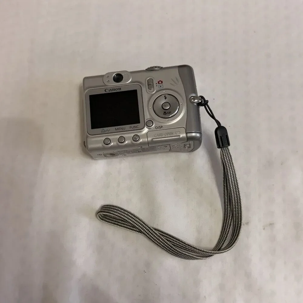 Canon PowerShot A520 4MP Compact Digital Camera 4x Zoom Silver USB AA Flash
